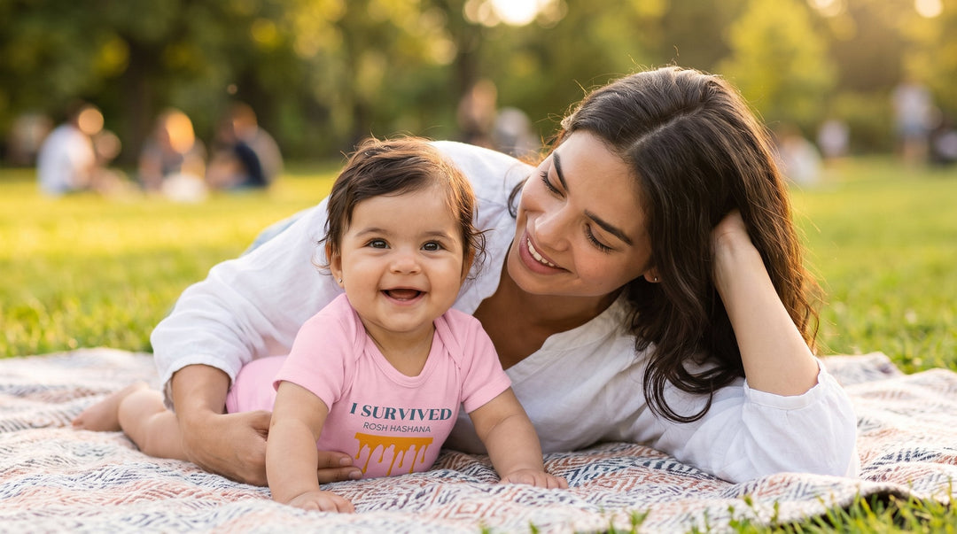 Mother with her baby in the I Survived Rosh HaShana one piece - emohtee baby one pieces