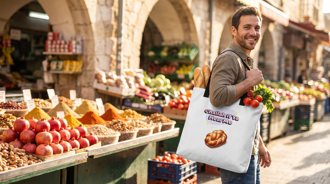 Man carrying the Challah If Ya Hear Me Jewish tote bag at Machane Yehuda market in Jerusalem