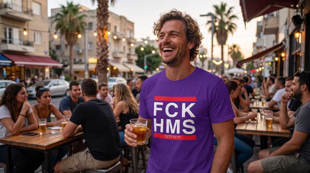 Man wearing the FCK HMS tee at a Tel Aviv bar terrace - emohtee FCK HMS collection