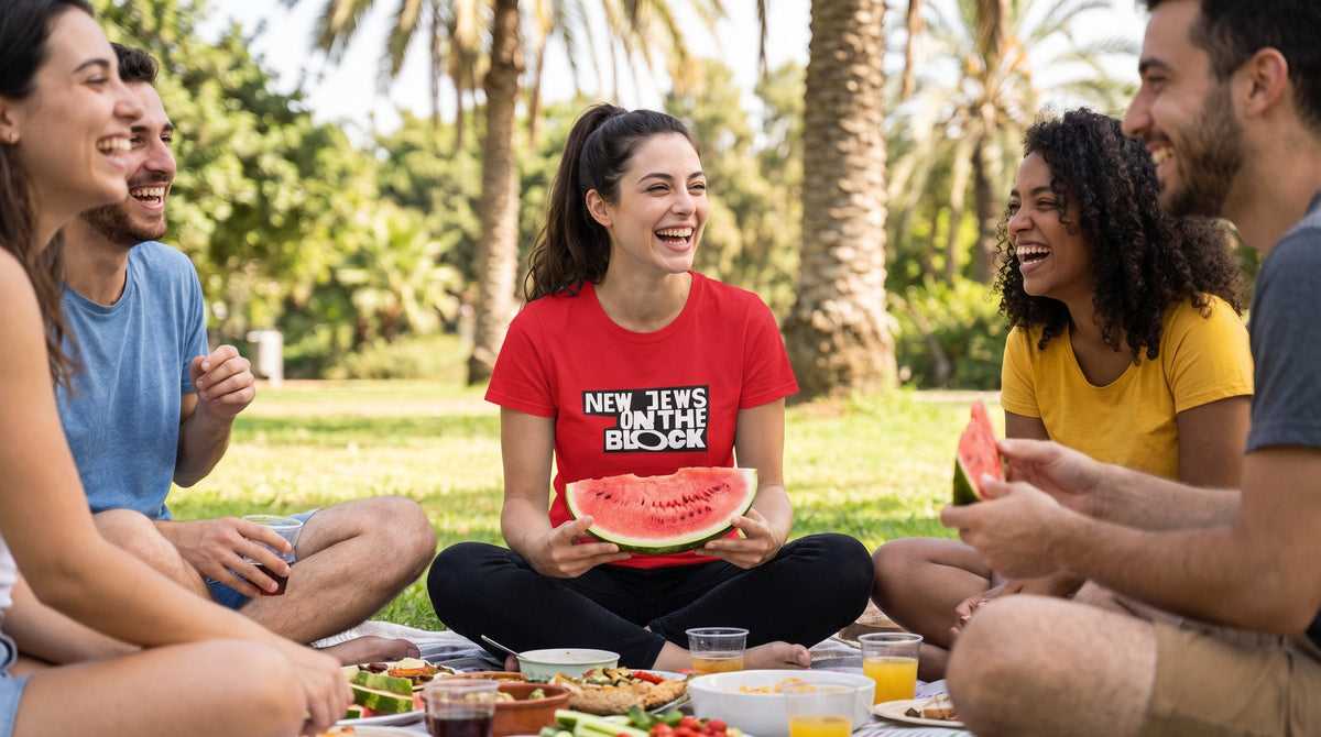 Woman in the New Jews on the Block tee at a park picnic - emohtee funny Jewish shirts