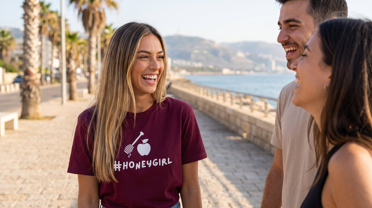 #Honeygirl T-shirt worn by a woman on the Haifa seafront promenade – MoT Member of the Tribe