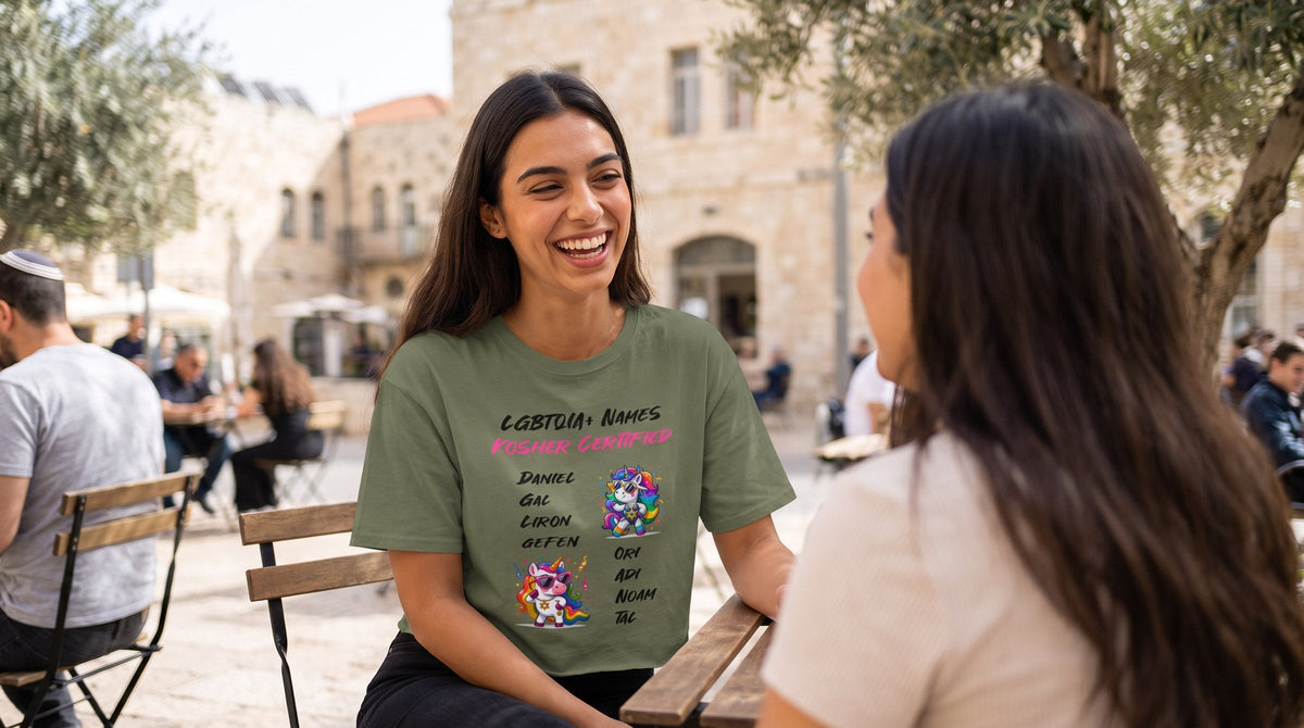 Kosher Certified Names T-shirt worn by a woman at a café on a Jerusalem stone plaza – MoT Member of the Tribe