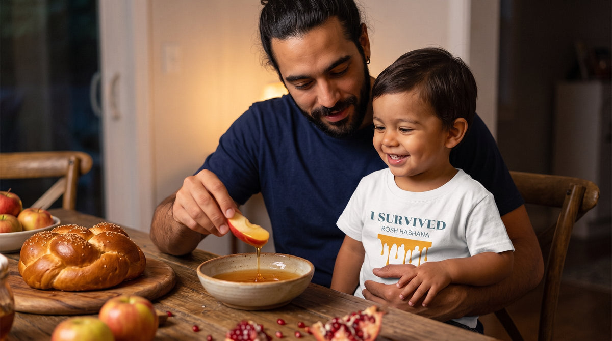 Toddler in the I Survived Rosh HaShana tee with his father at the holiday table - emohtee Rosh Hashanah apparel