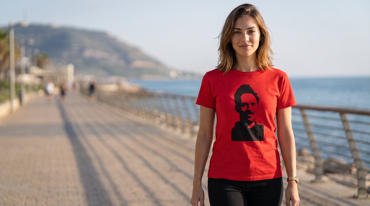 Shimon T-shirt worn by a woman on the Haifa seafront promenade – MoT Member of the Tribe
