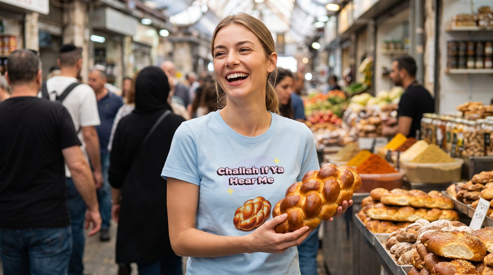 Challah If Ya Hear Me classic tee worn by a woman at a bakery in Machane Yehuda market – MoT Member of the Tribe
