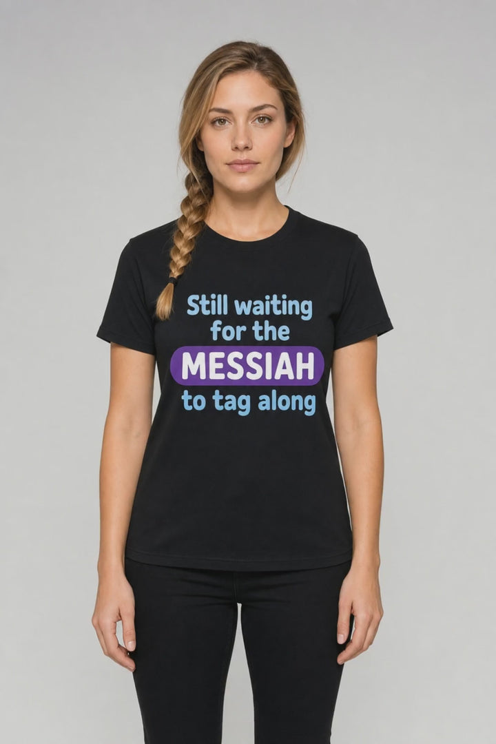 Woman wearing black Still Waiting For The Messiah t-shirt