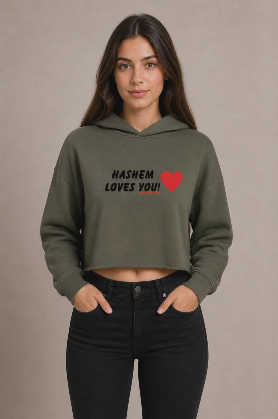 Woman wearing an olive green HaShem Loves You crop hoodie, Jewish pride apparel