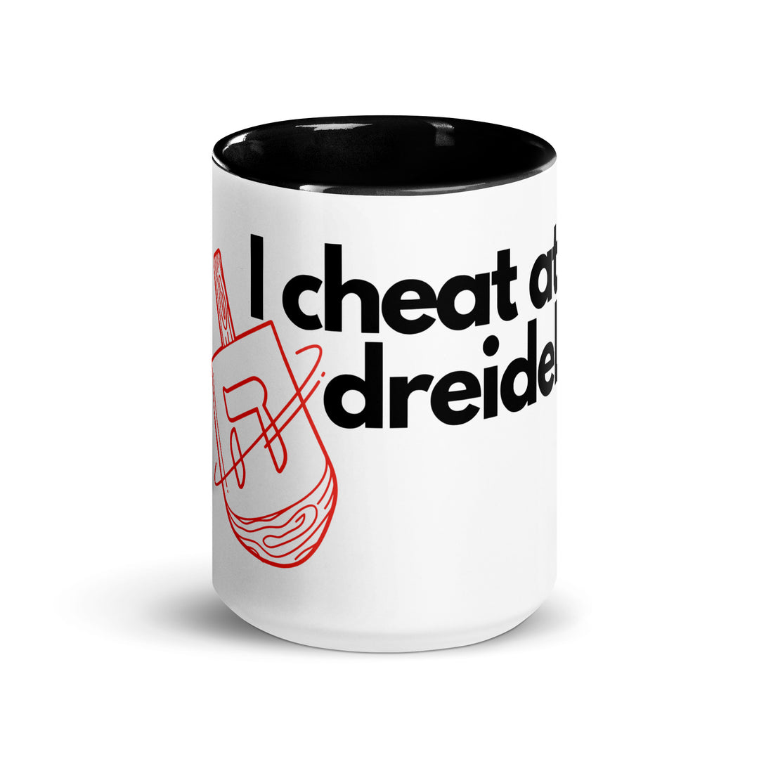 I Cheat At Dreidel Jewish pride mug with color inside - lifestyle shot