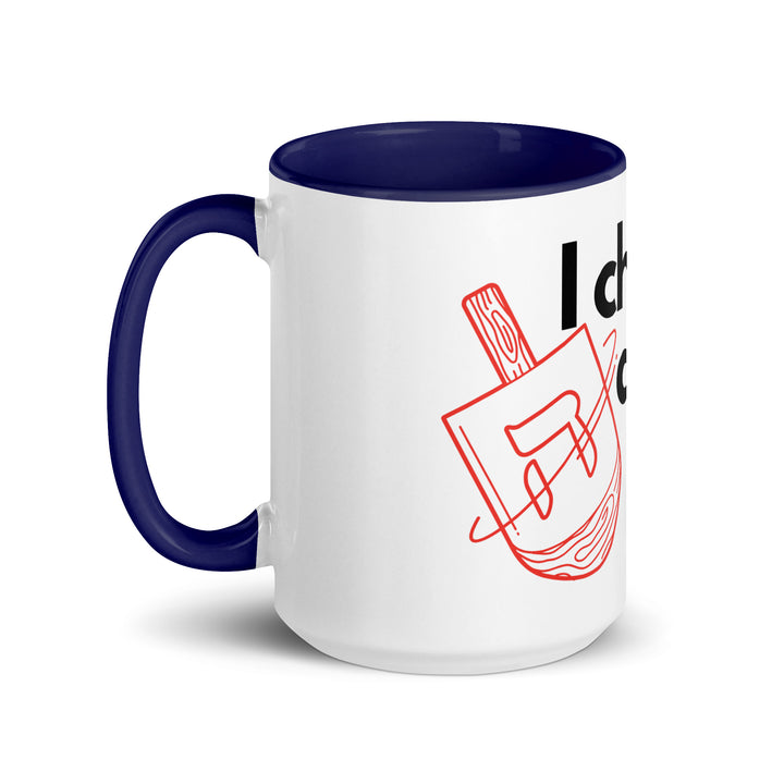 I Cheat At Dreidel Jewish pride mug with color inside - flat lay