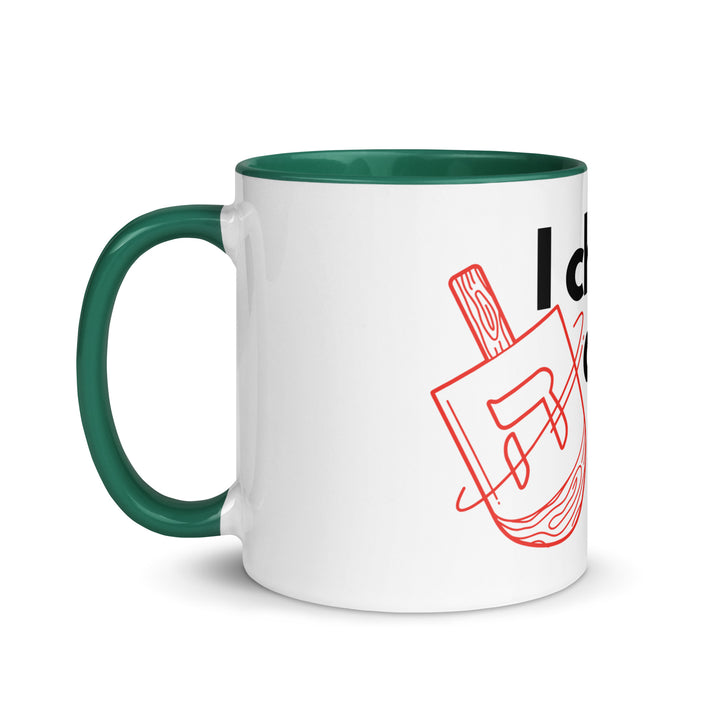 I Cheat At Dreidel Jewish pride mug with color inside - flat lay